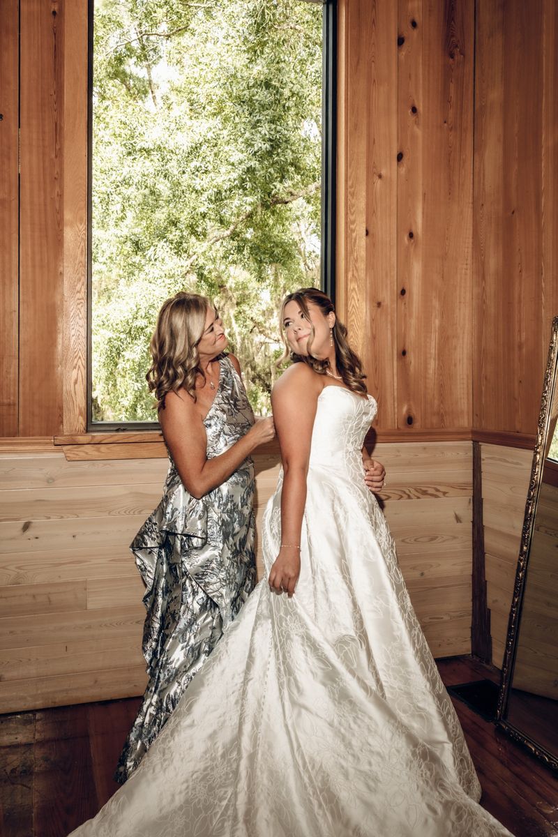 Bride and her mom getting ready