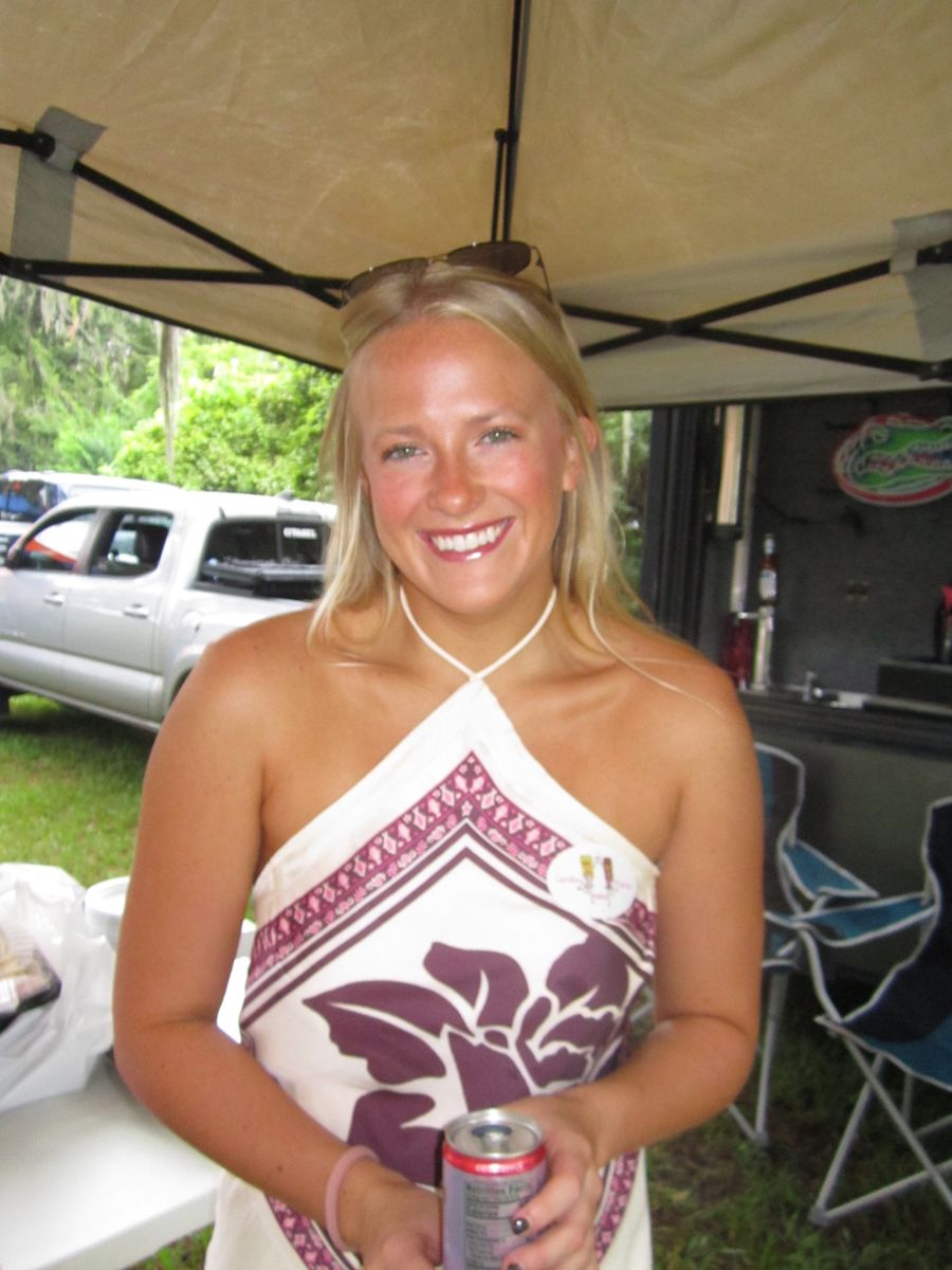 Client smiling at a tailgate